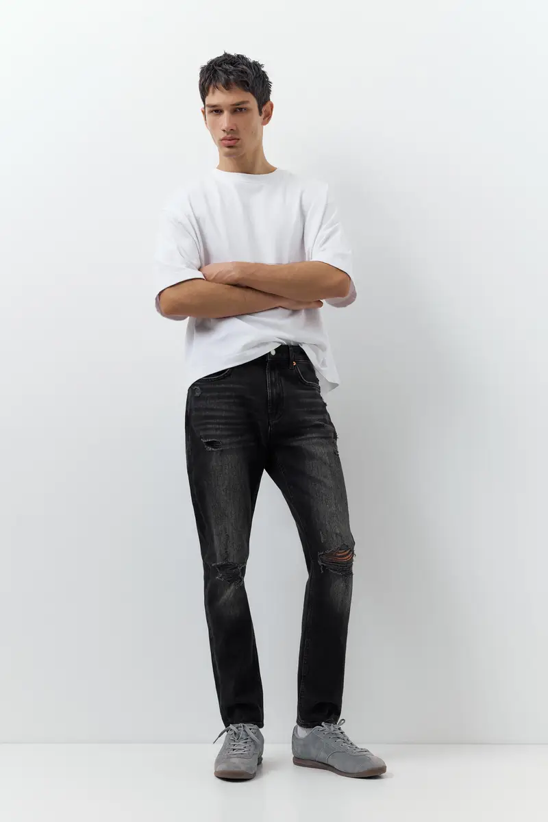 Jeans Slim Strappati Nero lavato