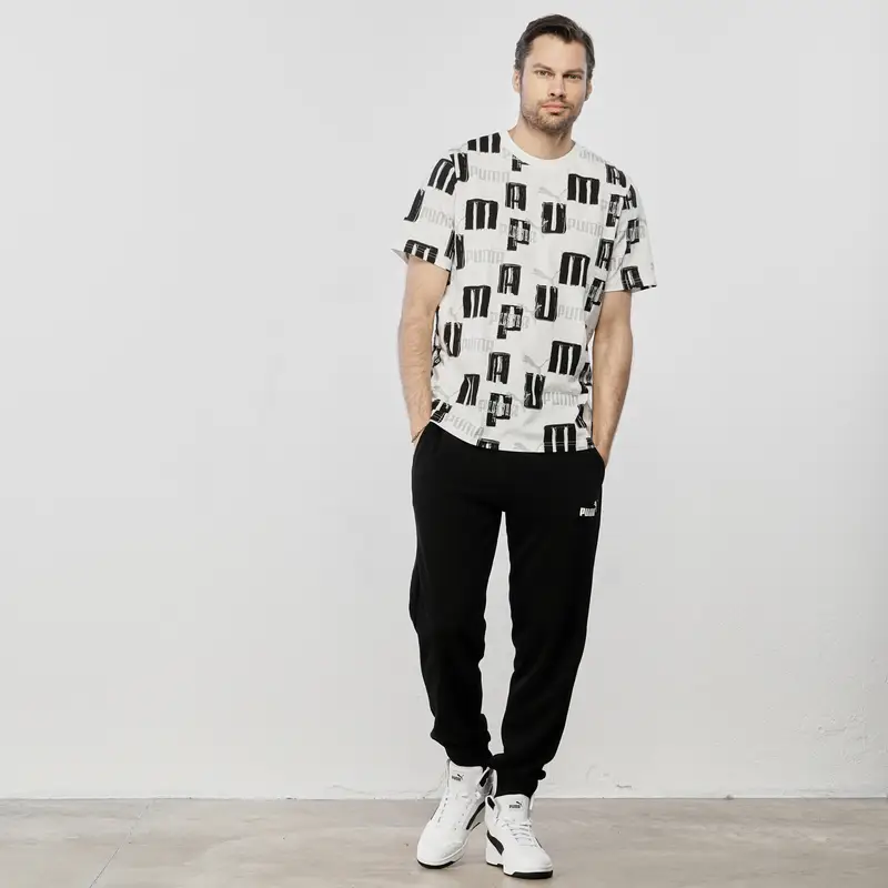 Pantaloni neri in tuta con tasche e polsini