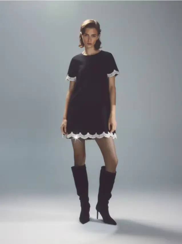 Abito mini con finiture in pizzo - nero