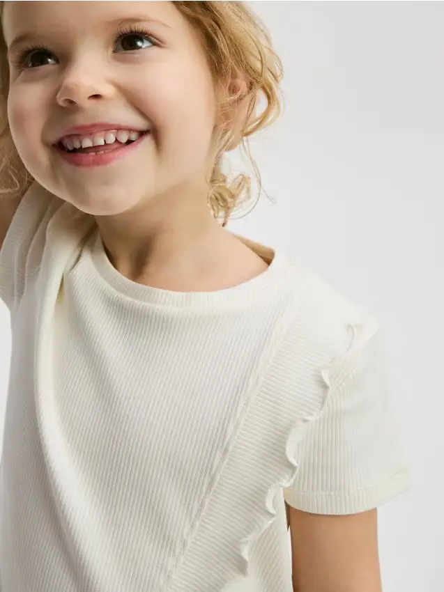 Blusa a costine con volant - nude