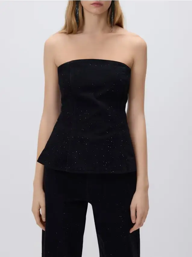 Blusa con applicazione brillante - nero