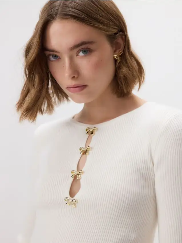 Blusa con applicazione decorativa - panna