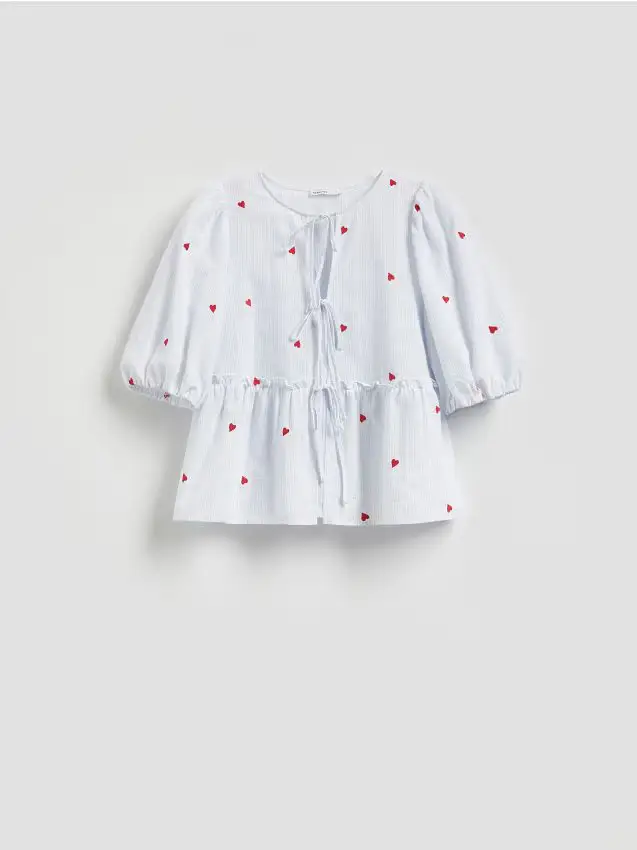 Blusa con base svasata - blu pallido