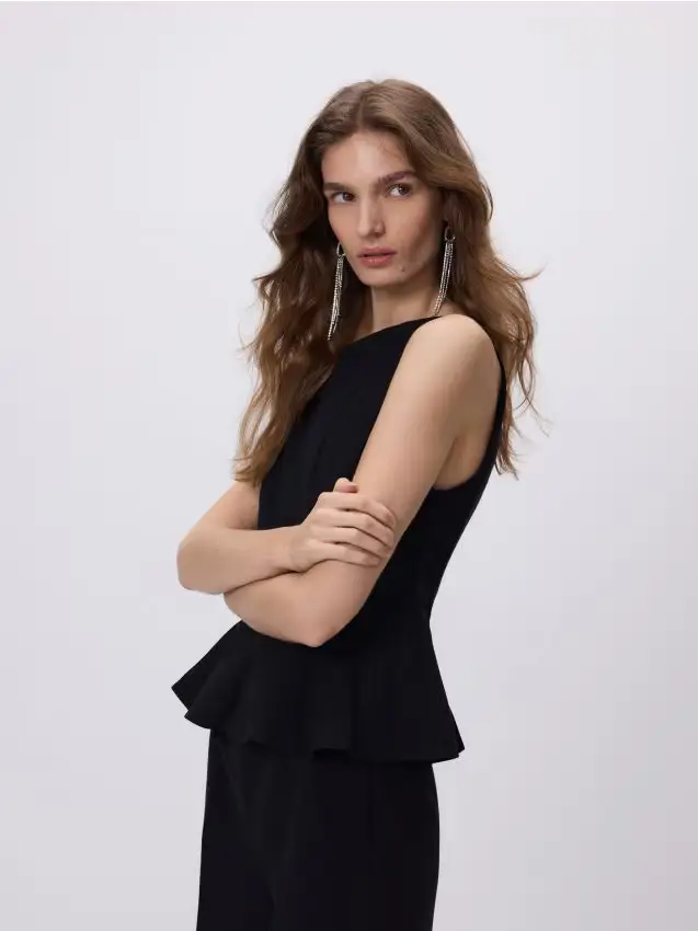 Blusa con base svasata - nero