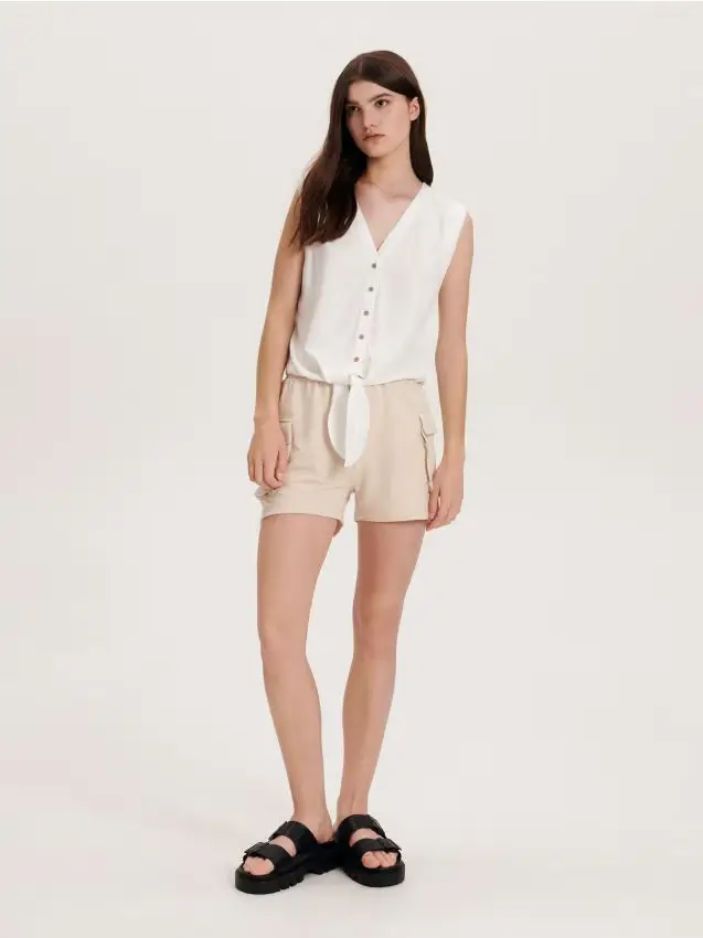 Blusa con nodo - panna