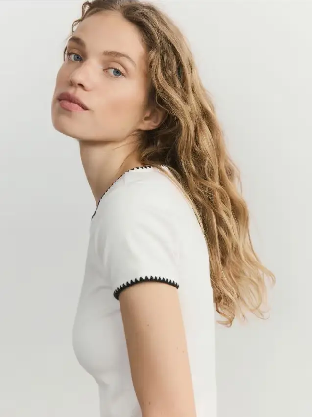 Blusa con piping a contrasto - panna