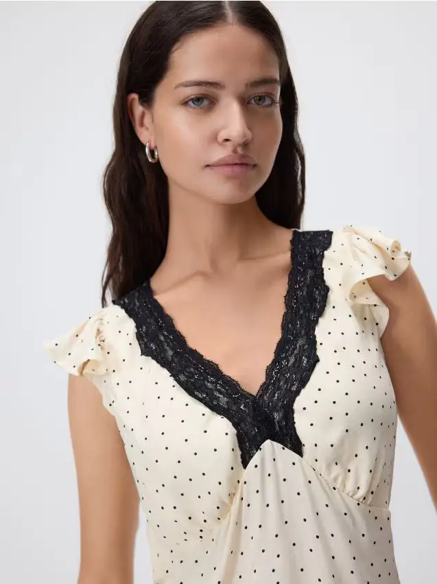 Blusa con pizzo - panna