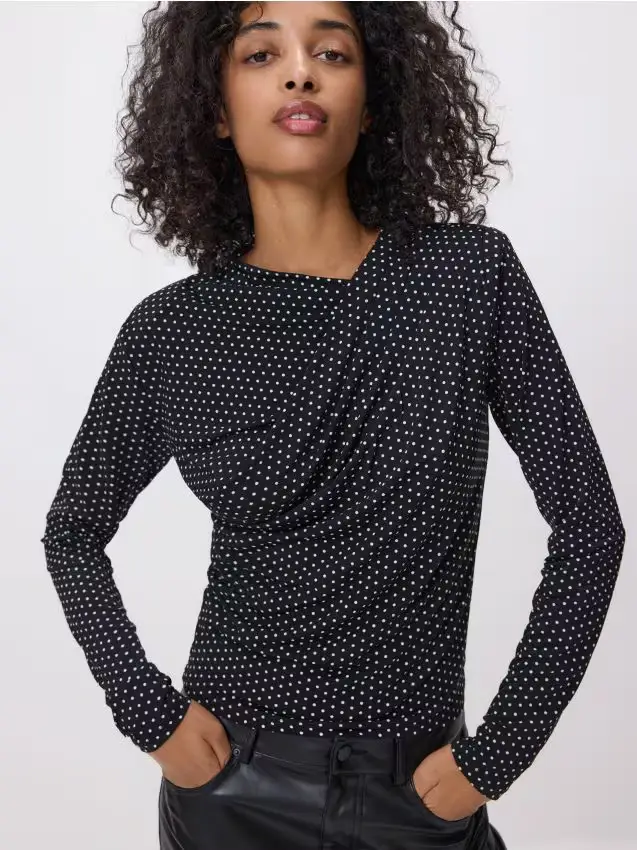 Blusa con pois - nero
