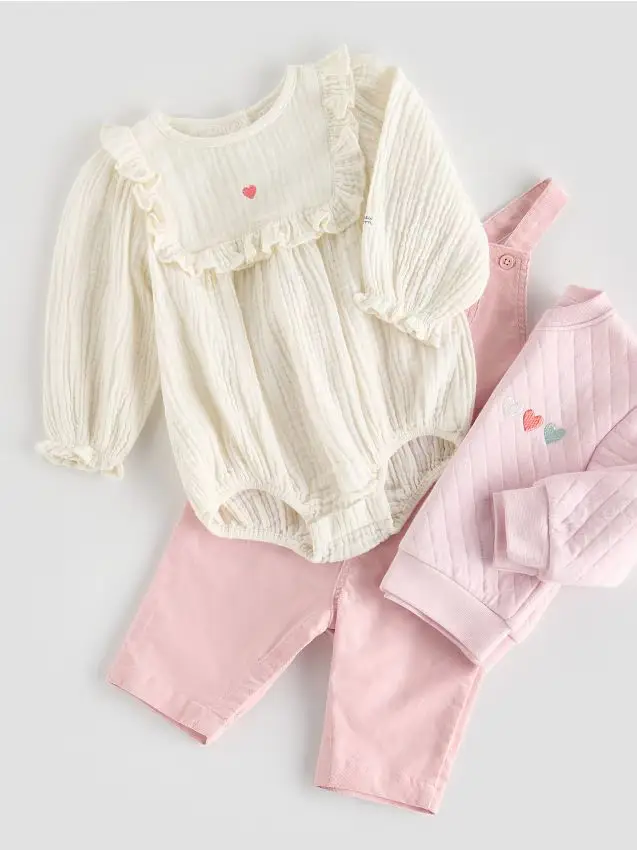 Body in mussola con balza - panna