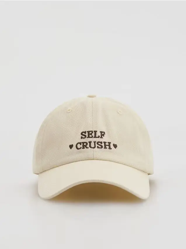 Cappello con visiera - beige