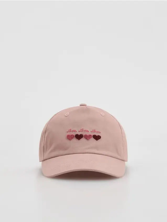 Cappello con visiera e applicazione - rosa