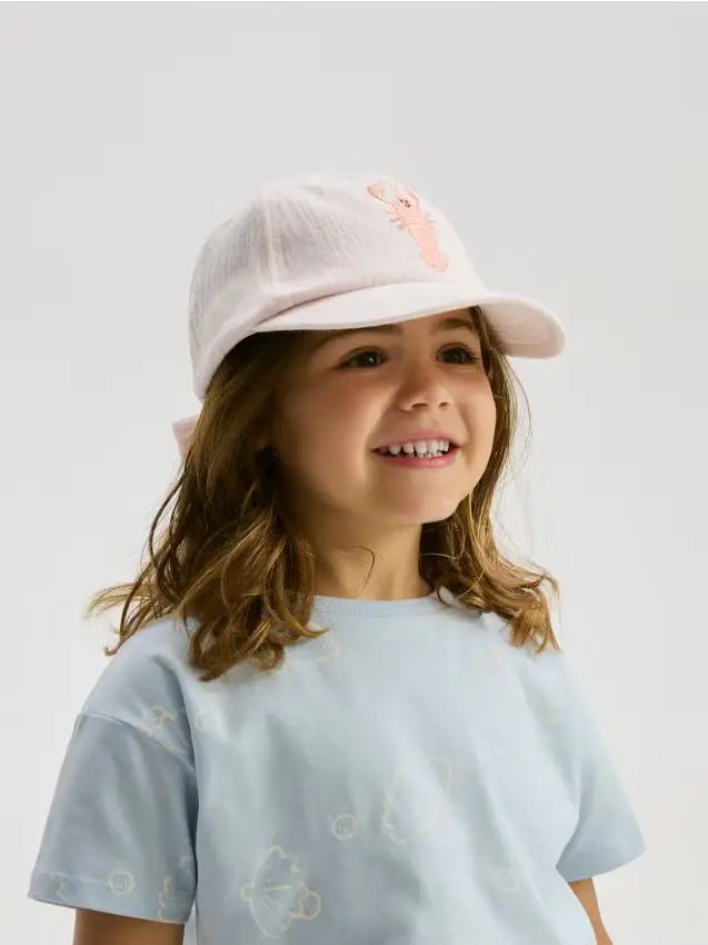 Cappello con visiera e ricamo - rosa pastello