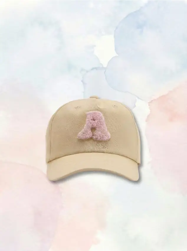 Cappello in cotone con toppa - panna