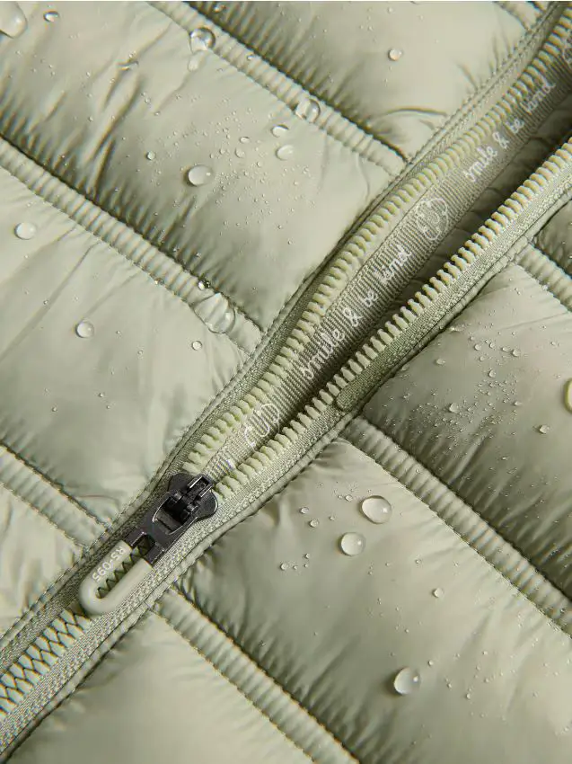 Giaccone trapuntato con cappuccio - verde pallido