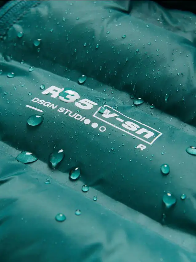 Giaccone trapuntato con cappuccio - verde petrolio