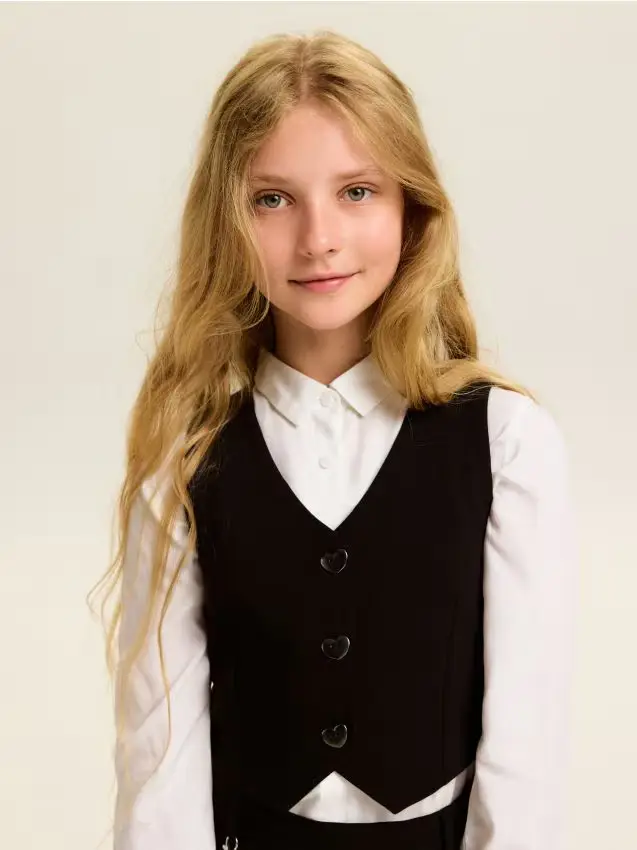 Gilet con bottoni decorativi - nero