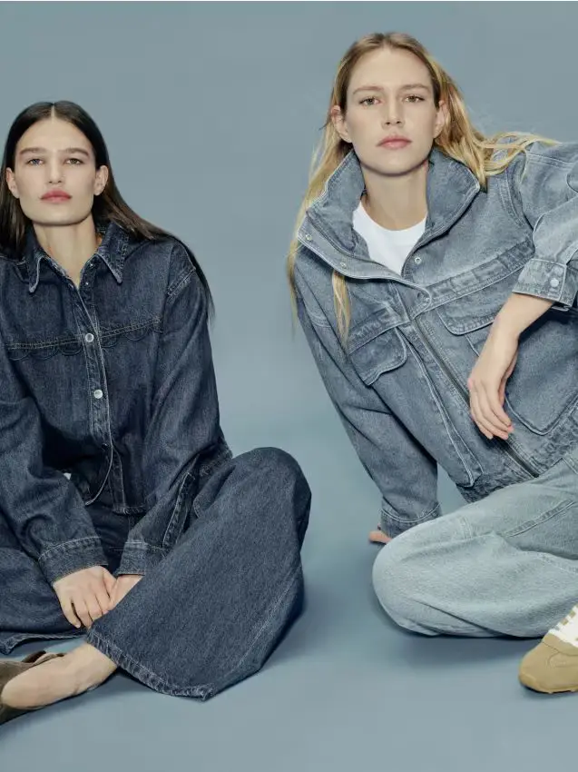 Jeans a gamba larga con tasche decorate - blu