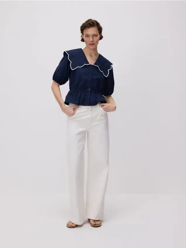 Jeans a gamba larga wide leg a vita media - bianco