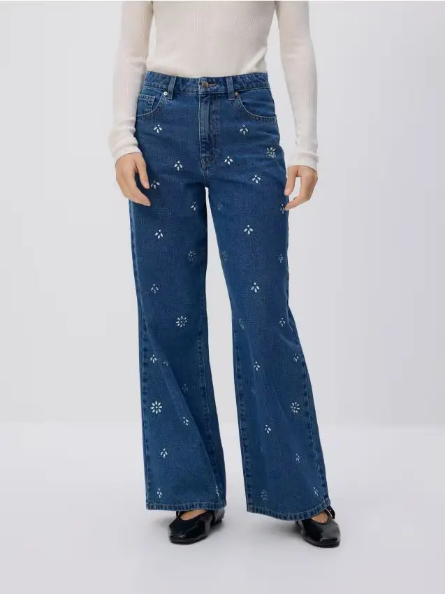 Jeans ampi con cristalli - blu
