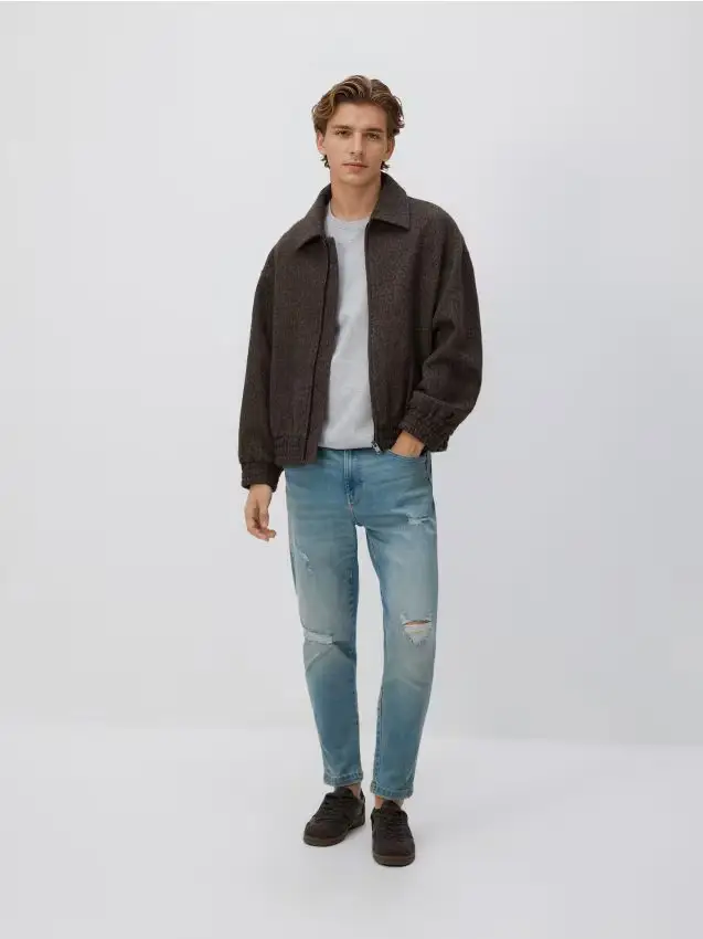 Jeans slim carrot fit strappati - blu