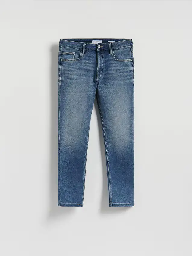 Jeans slim con effetto slavato - blu