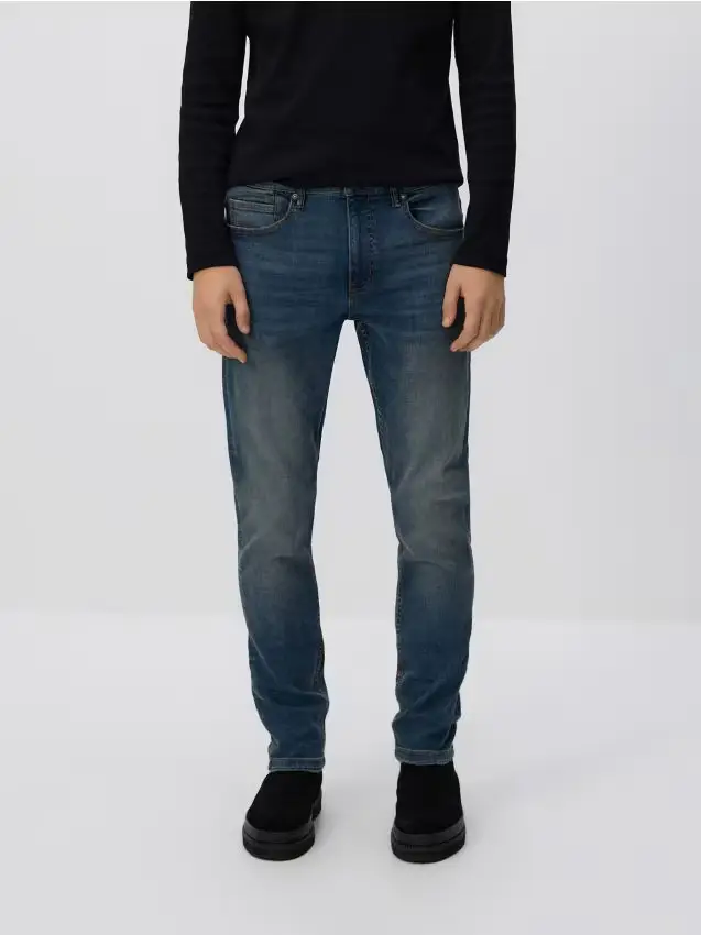 Jeans slim con effetto slavato - blu scuro