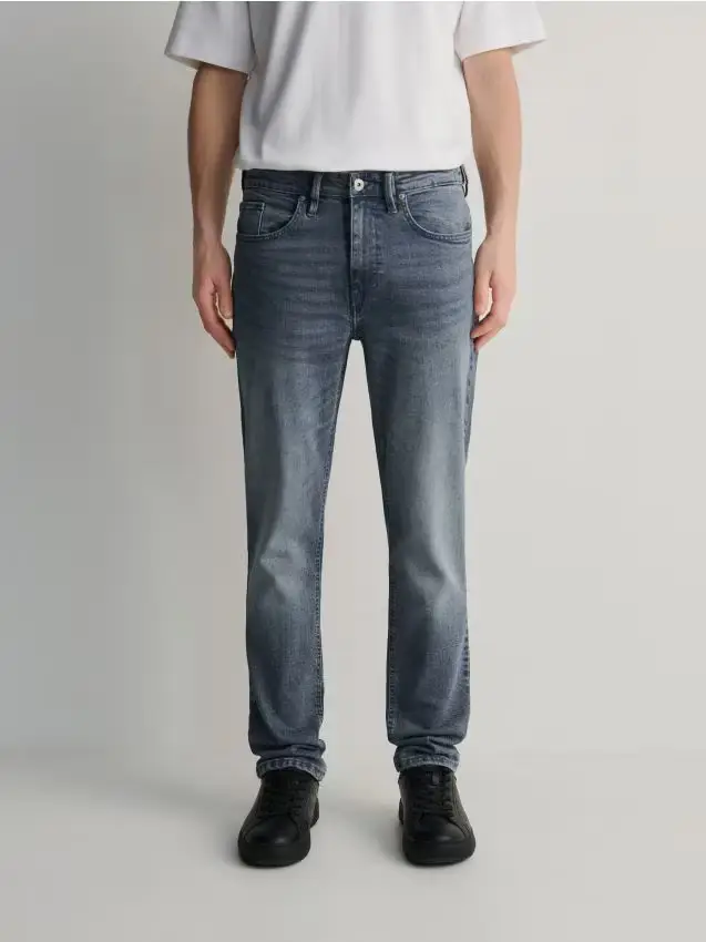 Jeans slim con effetto slavato - grigio chiaro
