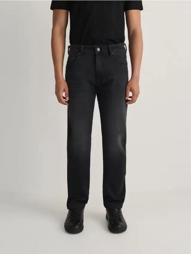 Jeans slim con effetto slavato - grigio