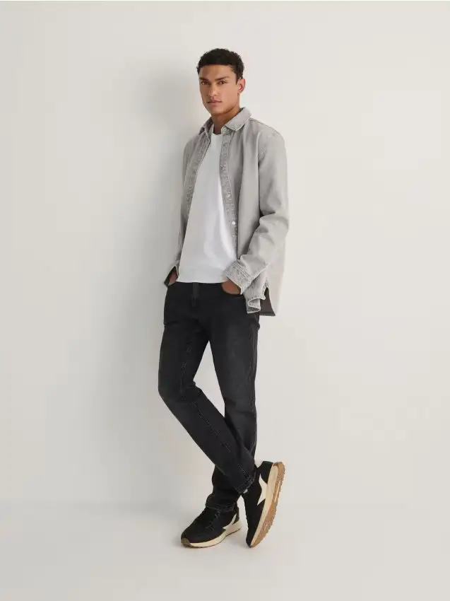 Jeans slim con effetto slavato - grigio