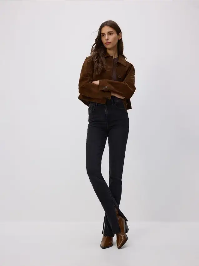 Jeans slim fit con spacco - nero