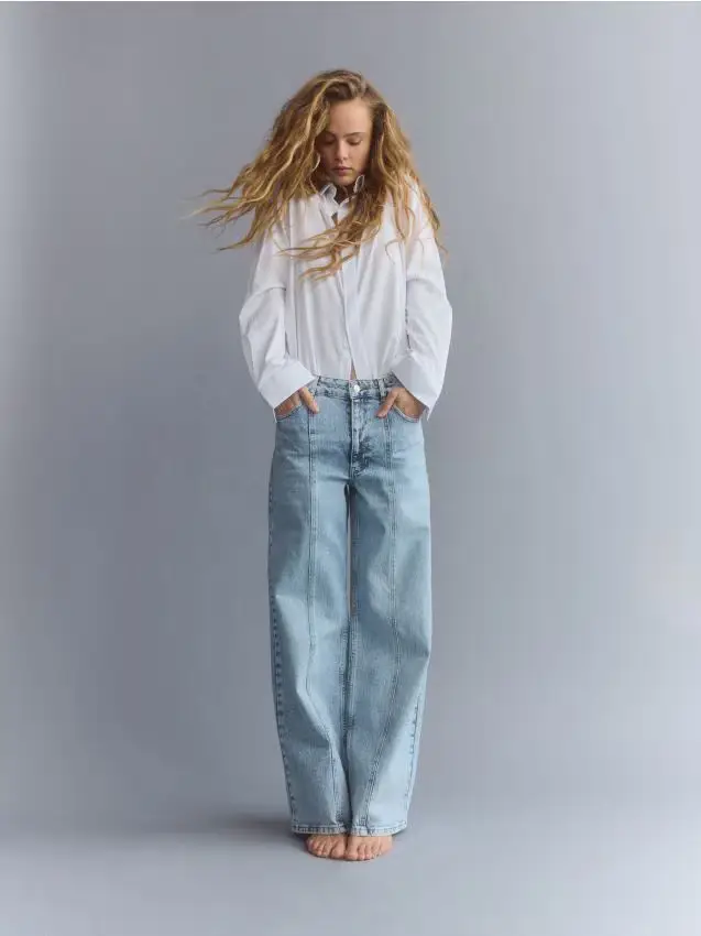 Jeans wide leg con impuntura - blu