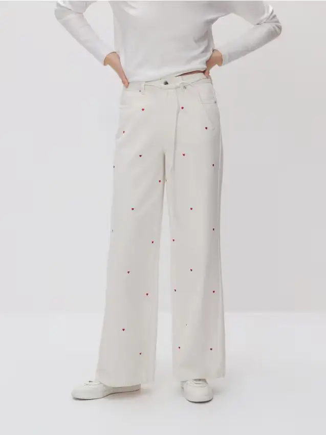 Jeans wide leg con ricamo - bianco