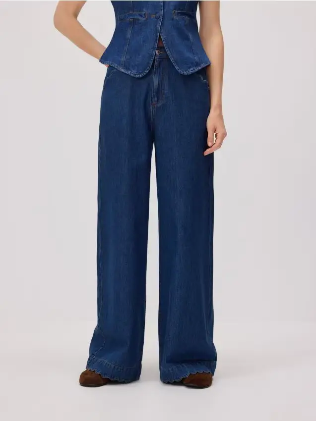 Jeans wide-leg con rifinitura decorativa - blu