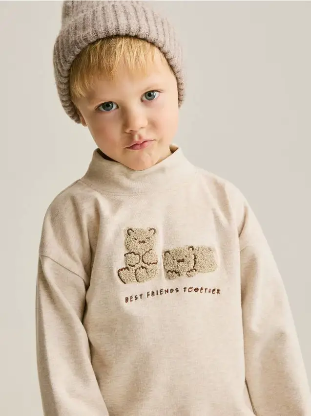 Manica lunga con collo alto - beige