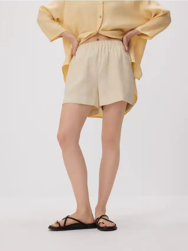 Pantaloncini in lino - giallo chiaro