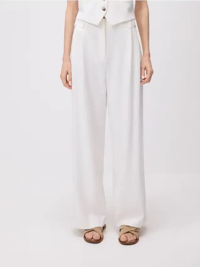 Pantaloni a gamba ampia - bianco