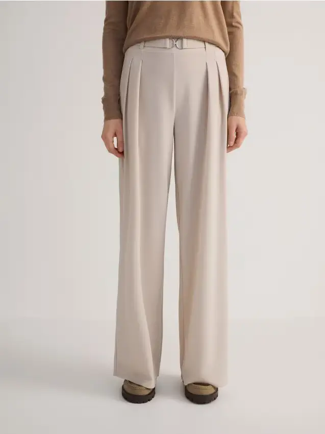 Pantaloni a gamba ampia con cintura - beige
