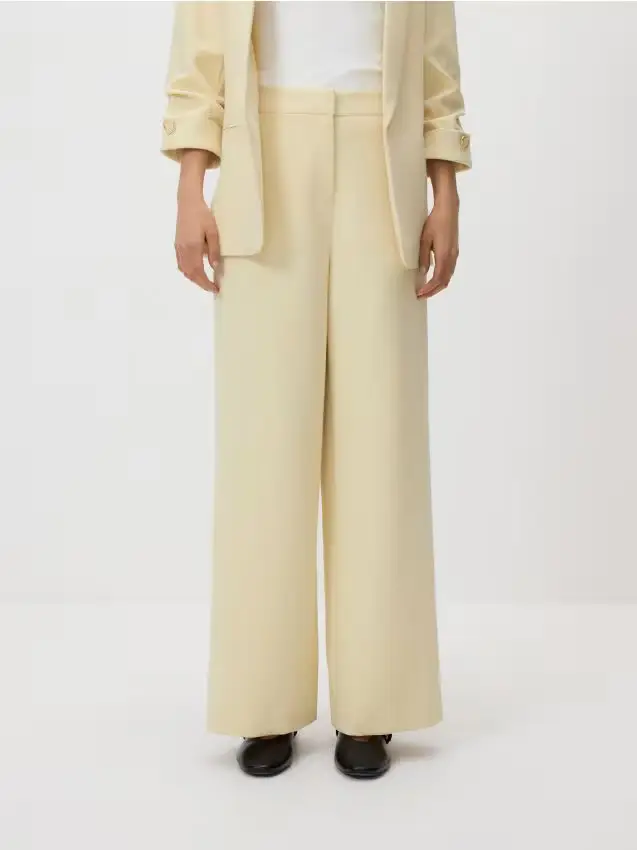 Pantaloni a gamba larga - giallo chiaro