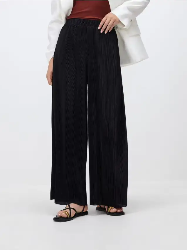 Pantaloni a pieghe a gamba ampia - nero