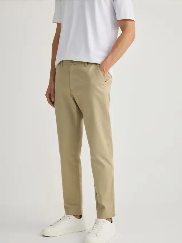 Pantaloni chino con pince - beige