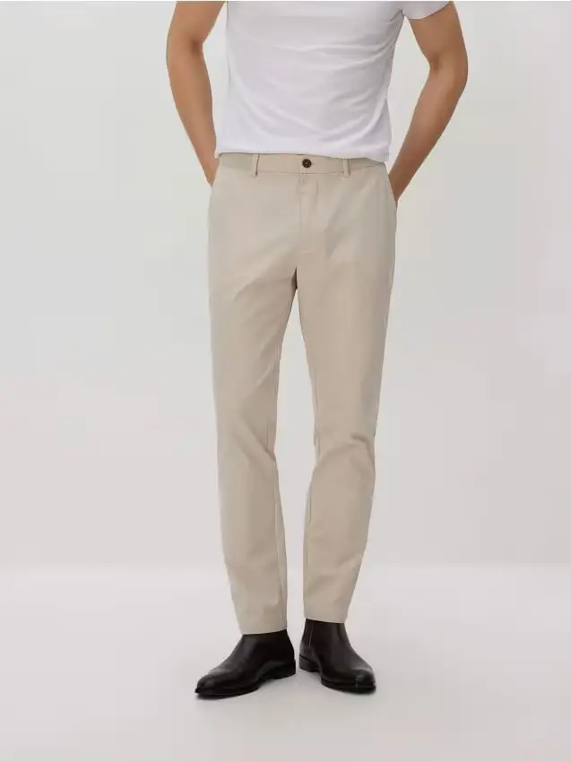 Pantaloni chino con pince - beige