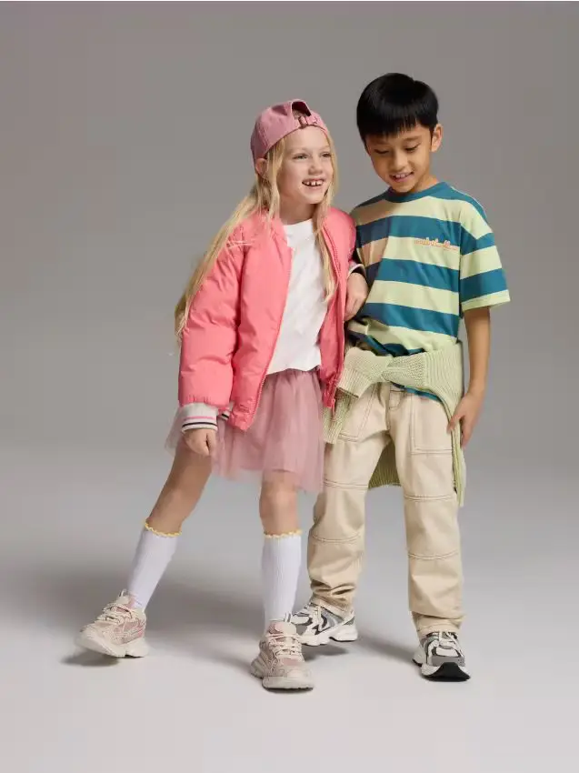 Pantaloni con cuciture a contrasto - panna