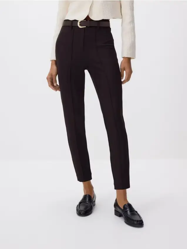 Pantaloni con impunture - marrone