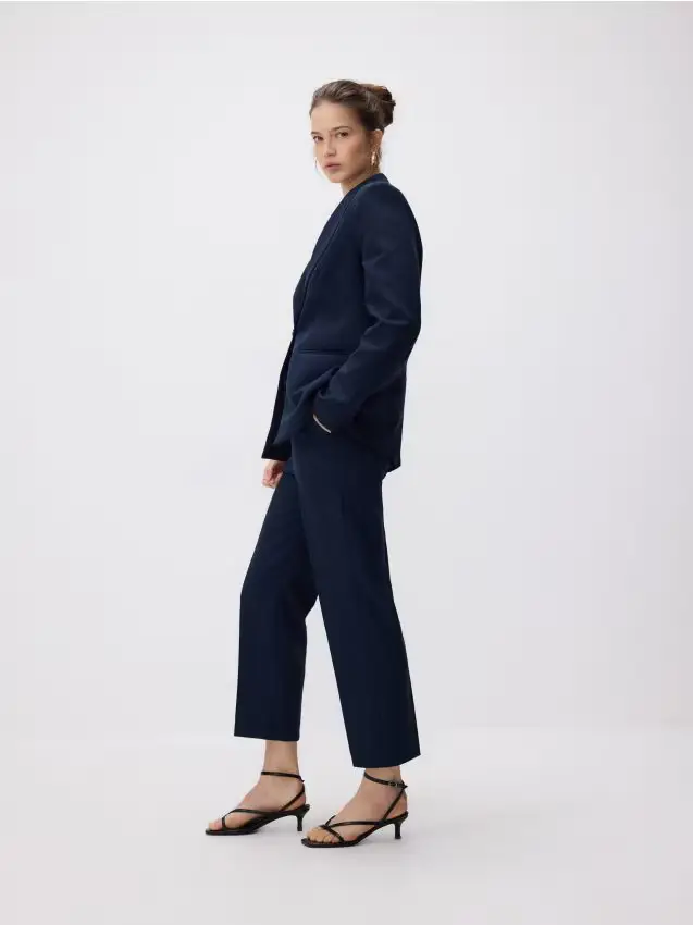 Pantaloni con piega stirata - blu scuro