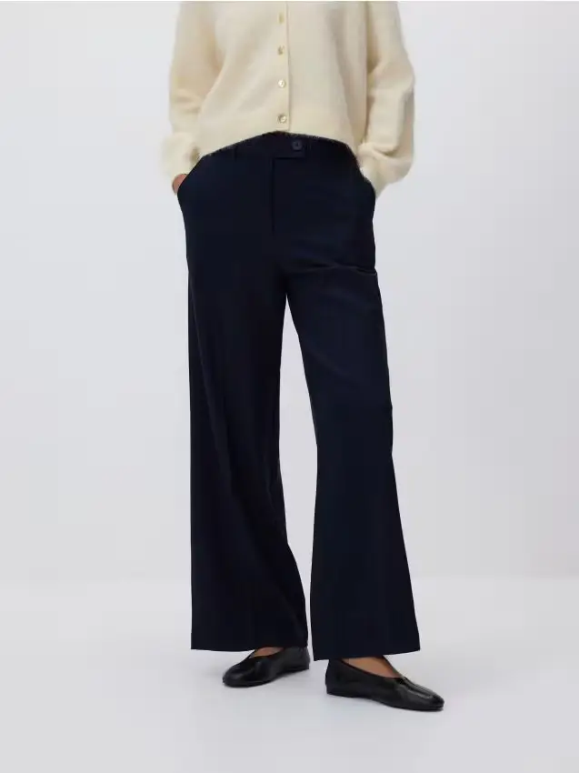 Pantaloni con piega stirata - blu scuro