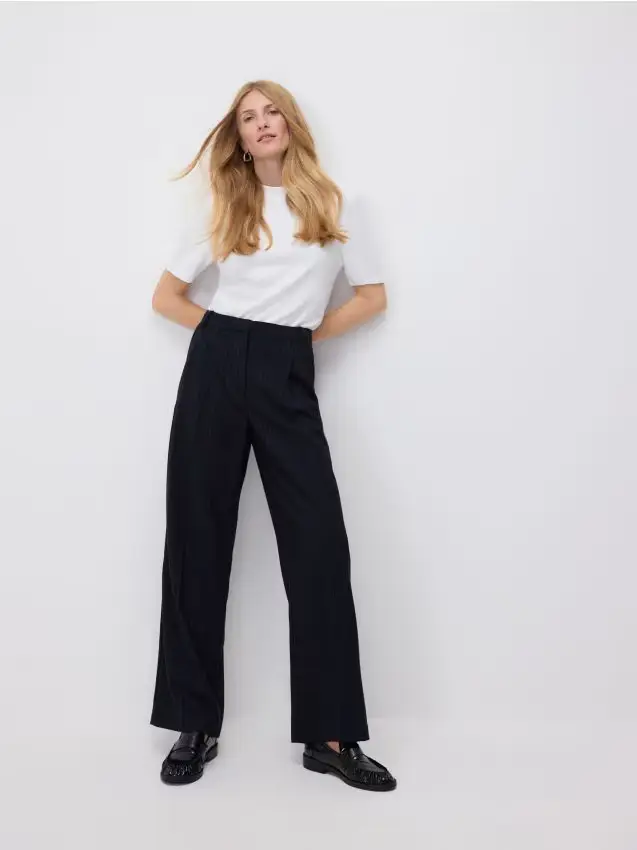 Pantaloni con piega stirata - multicolore