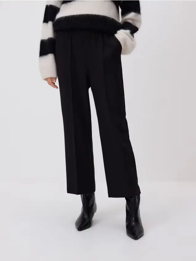 Pantaloni con piega stirata - nero