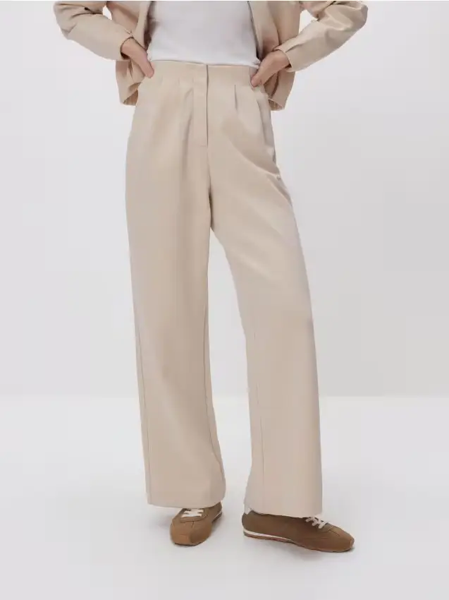 Pantaloni con pinces - beige