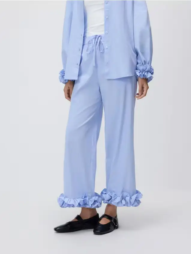 Pantaloni con volant - blu pallido