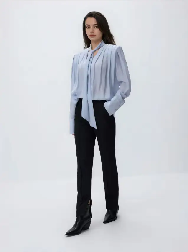 Pantaloni con zip - nero